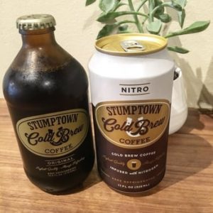a bottle of nitro coffee and a can of cold brew