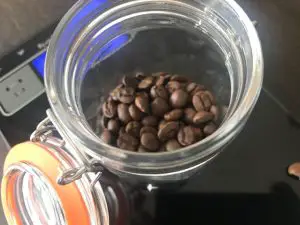 coffee beans on top of a coffee scale