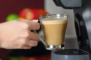 nice coffee coming from a coffee machine
