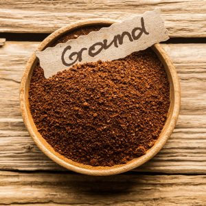 ground coffee with a sign saying grind