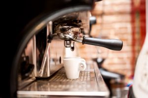 Espresso machine pouring a shot