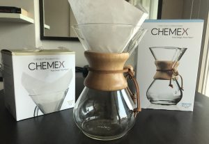 photo of chemex with a filter in a the chemex boxes either side